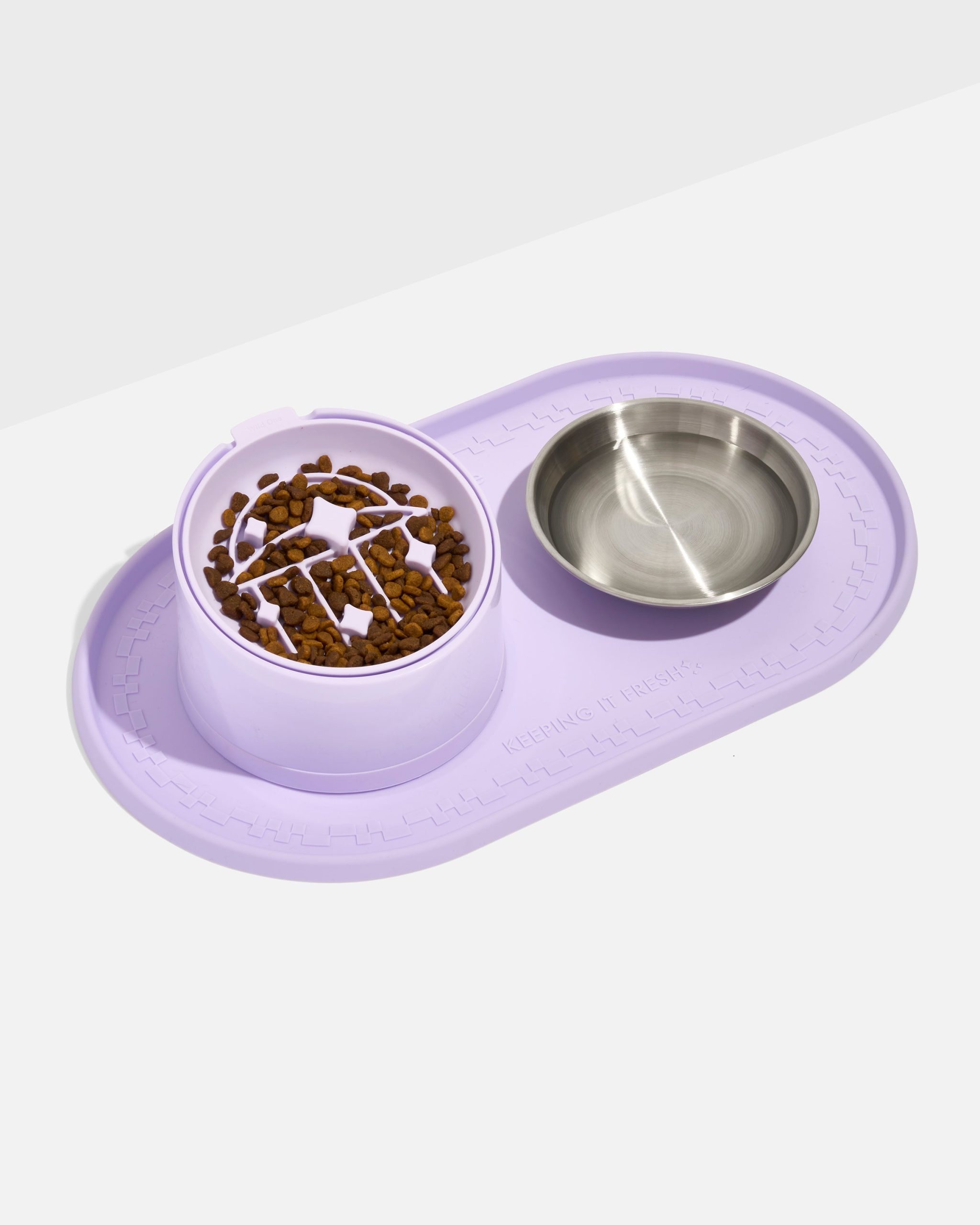 WO_VM_Cat_Placemat_SlowFeeder_SlantedBowl_Lilac_PDP_01_4x5_Web_b43e7068-3806-4fde-9ff0-260c1fd0e168.jpg