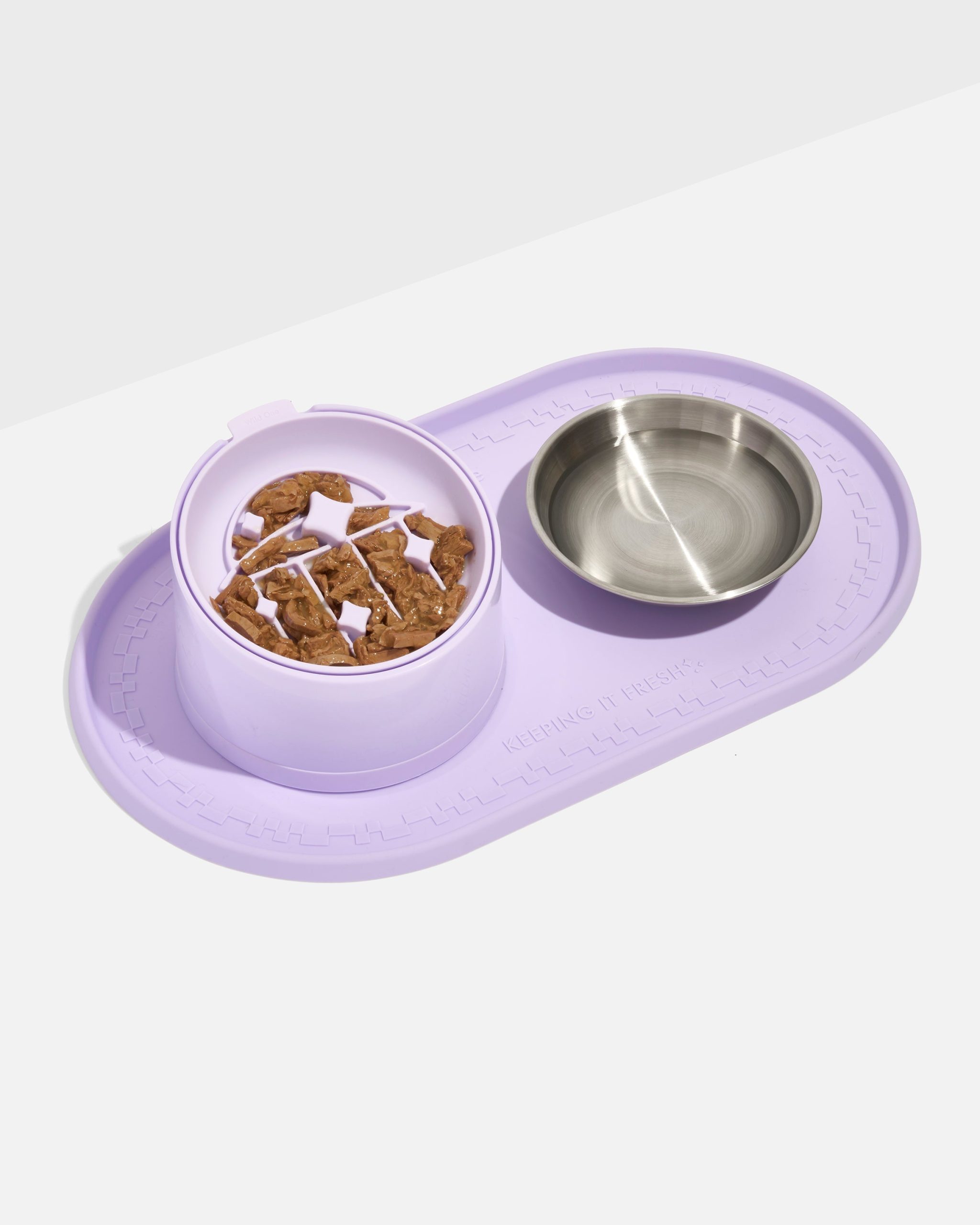 WO_VM_Cat_Placemat_SlowFeeder_SlantedBowl_Lilac_PDP_03_4x5_Web_c7bbe813-65fd-4214-9a36-a0af8ae4cf2b.jpg